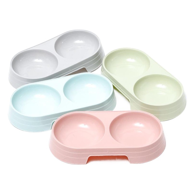 Macaron mascota doble tazón vajilla en stock tamaño pequeño oval gato tazón simple viento perro tazón comida tazón para mascotas al por mayor