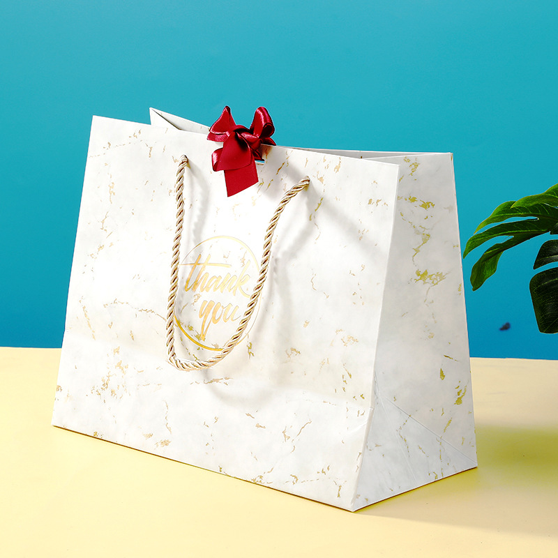 纸袋定制ins风时尚礼品袋大理石蝴蝶结手提袋婚庆服装店包装纸袋