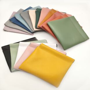In stock colorful spring piece Pu bag earphone tight mouth storage bag earphone data cable portable shrapnel storage bag