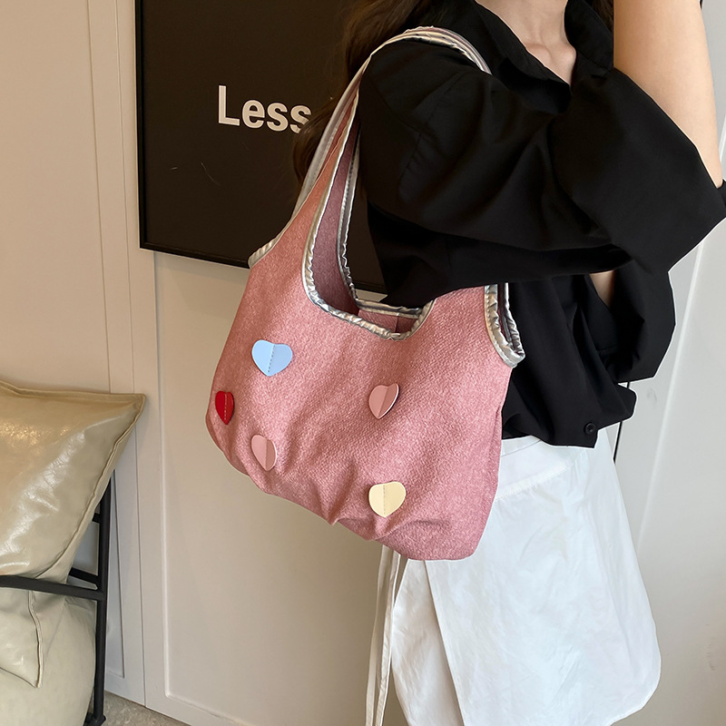 Bolsas de lienzo de nicho coreano para mujeres verano 2024 nueva moda bolsas de bolsa casuales, bolsas de brazo de la niña dulce