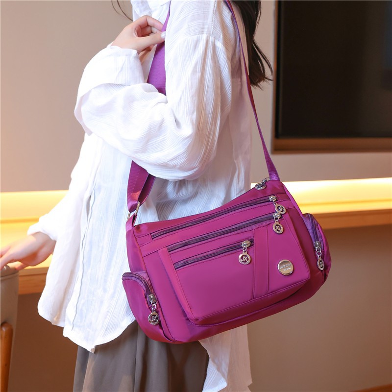 Solid color capacious nylon waterproof one-shoulder bag