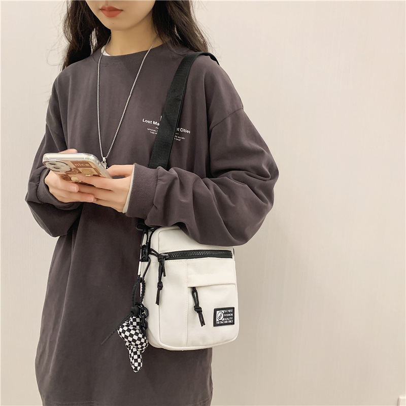 스트리트 패션 커플 작은 사첼 여성의 한국 스타일 패션 캐주얼 캔버스 가방 남자의 거리 휴대 전화 숄더백