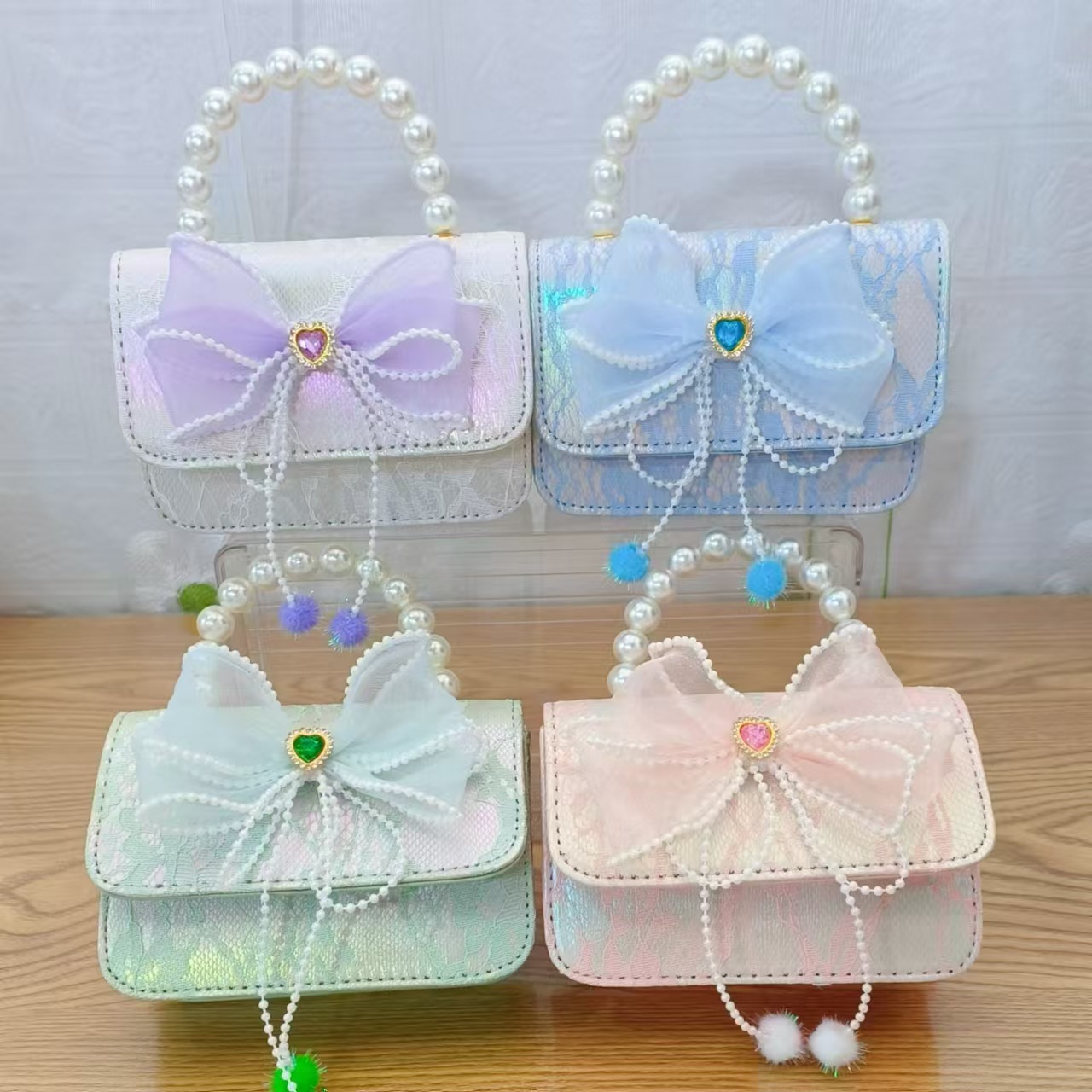 Bolsa de arco princesa bolso de perlas bolso de mano cadena bolso de cinturón pequeño viento bolso de niñas bolso de regalo del día de los niños bolso pequeño