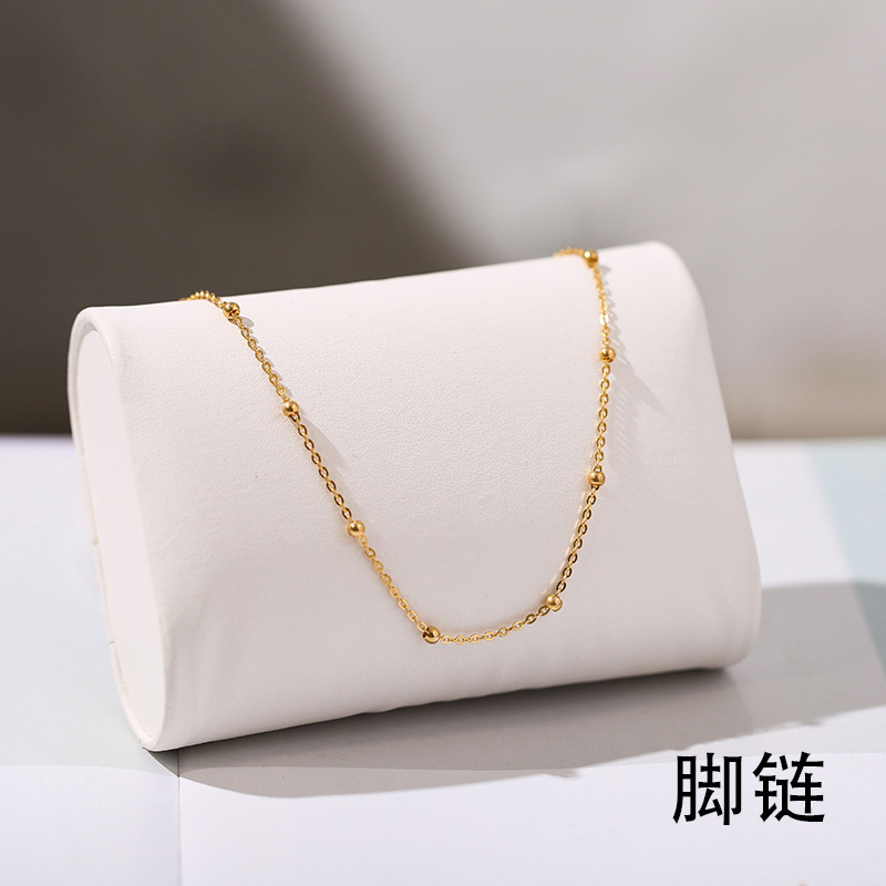 Pequeñas cuentas redondas tobillera de acero de titanio cuentas de arroz de las mujeres anillo de la pierna joyería Accesorios de playa de las mujeres joyería TikTok estilo popular