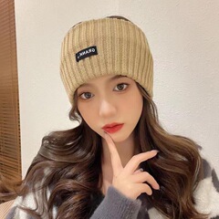 秋冬のシンプルな外付けの女性の包頭ファッションの頭のカチューシャのニットのヘアバンドは髪を束ねて保温して額の運動の頭巾を保護します。