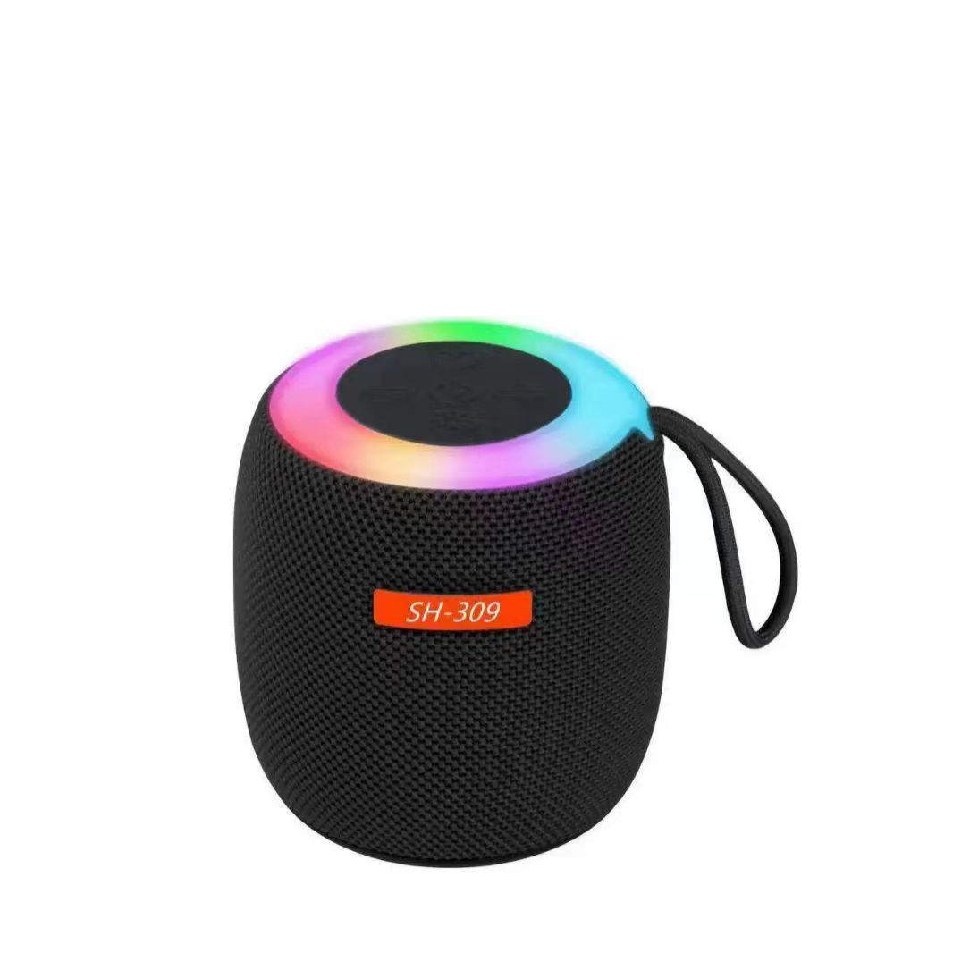 Transfronterizo SH309 tela Bluetooth mini altavoz de luz colorida gran volumen pequeño larga duración de la batería mayorista
