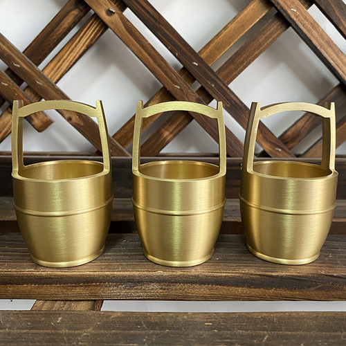 A bucket of gold ornaments, pure brass, a bucket of rivers and mountains, a small bucket of gold, a shoulder pole, office desktop and living room furnishings