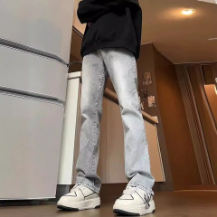 スモッグの煙の灰色のジーパンの男性のタイプの春と秋のアメリカの復古のvibeズボンは身を修める弾力の小さいラッパのストレートなズボンです。