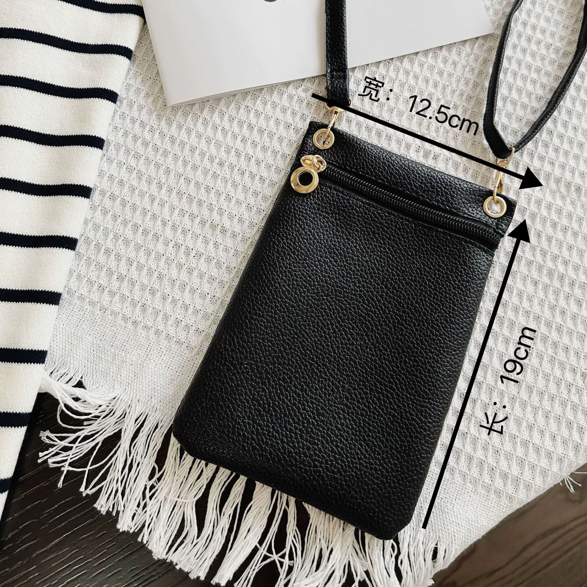 Sınır ötesi sıcak satış 2024 sonbahar ve kış yeni hakiki deri kadın çantası mini crossbody çanta basit küçük kare çanta yumuşak inek derisi cep telefonu çantası
