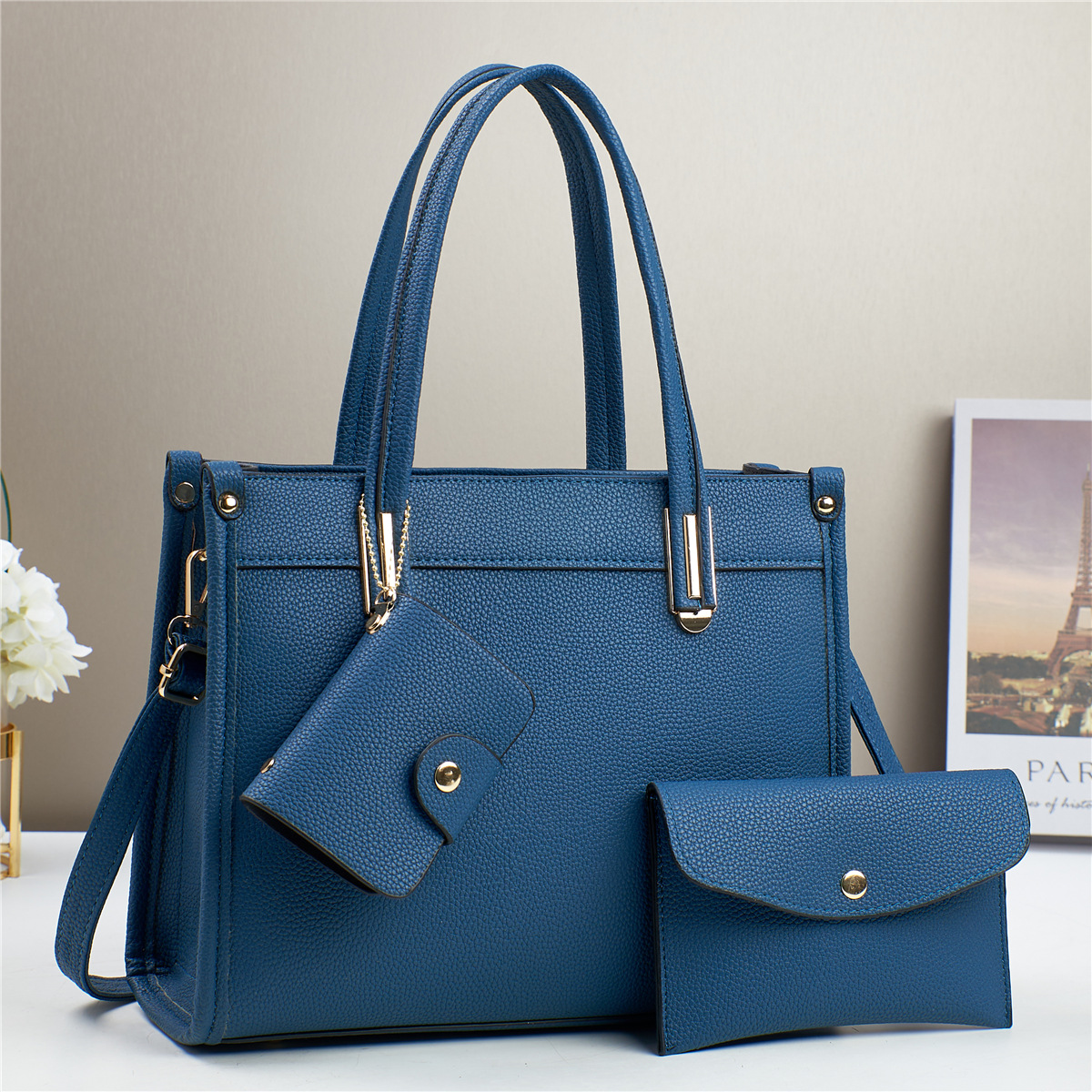 Fabricantes bolsos de comercio exterior mujeres 2025 nuevo bolso de mano mano textura de hombro liso inclinado bolso de moda de mujer coreana