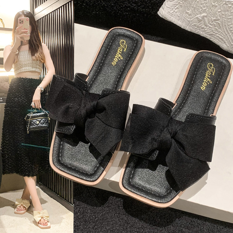香風蝶結びの一字スリッパの女性夏の外はネットの赤い新型のファッションの平底のアンドロメダの風を着て涼しくて柔らかい底を引きずっています。|undefined