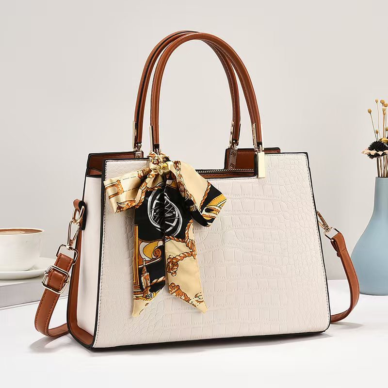 2025 nuevo fabricante de bolsas de cocodrilo de comercio exterior primavera y verano bolsas de mano de viaje de mujer versátil Emperor Rhino
