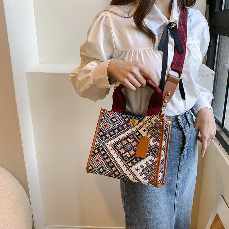Gran capacidad lona Plaid Portátil Bolsa femenina 2024 transfronteriza primavera nuevo trabajo viajero hombro bolsa de mensajero