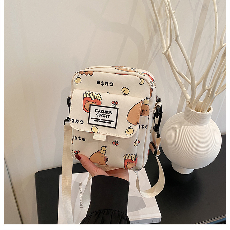 Cartoon animal print, many pockets, few bags, single-shoulder bag for girls, large capacity, cute graffiti, lightweight schoolbag for primary and middle school students undefined