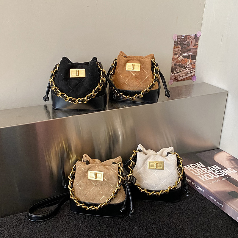 Bolsa de hombro de moda coreana para niños y niñas, bolsas de cadena de mini bolsas para bebés, bolsas de cuerda de extracción nuevas