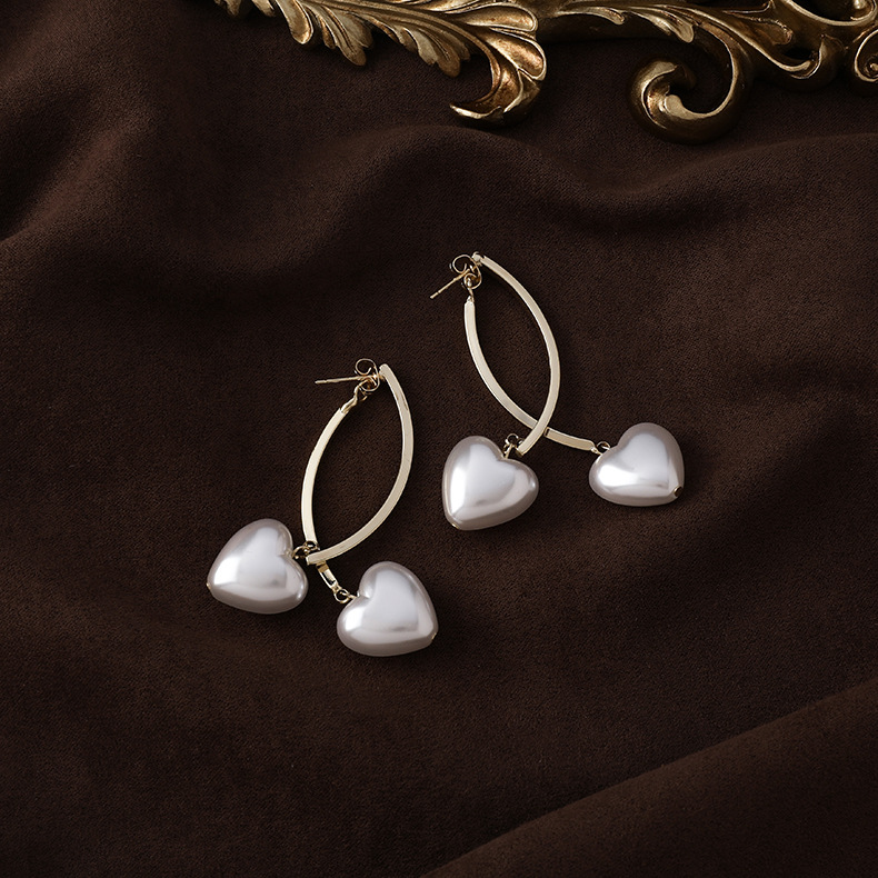 Simple Heart-shaped Pearl Cross Long Earrings display picture 1