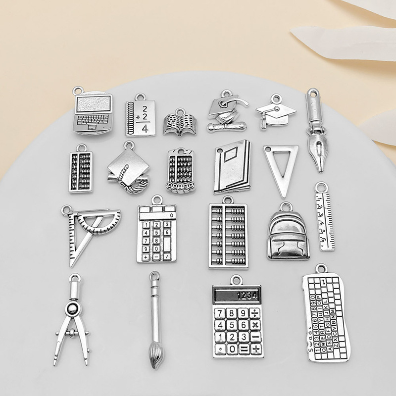 20 Ancient Silver Zinc Alloy Graduation and School Season Tools Ruler Abacus School Bag Pen Pendant DIY Jewelry Accessories