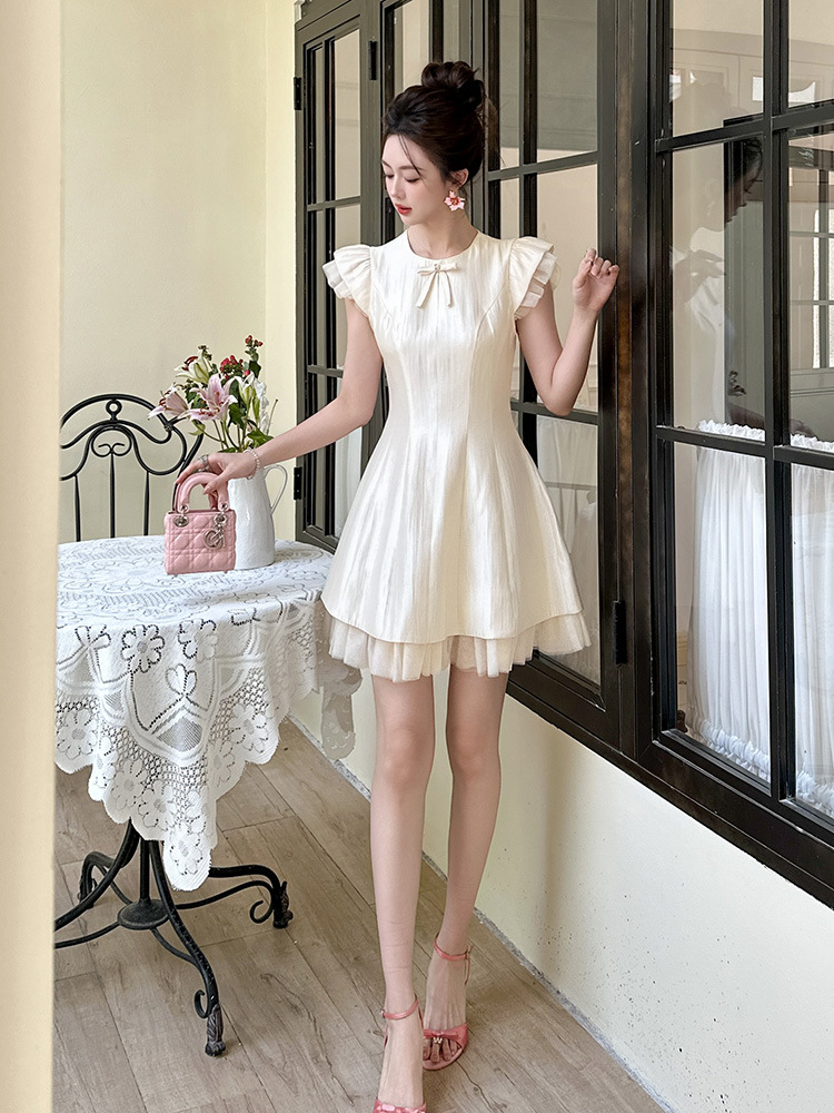 Váy chữ A phồng tay ngắn thắt eo nơ kiểu Pháp — Kem mơ