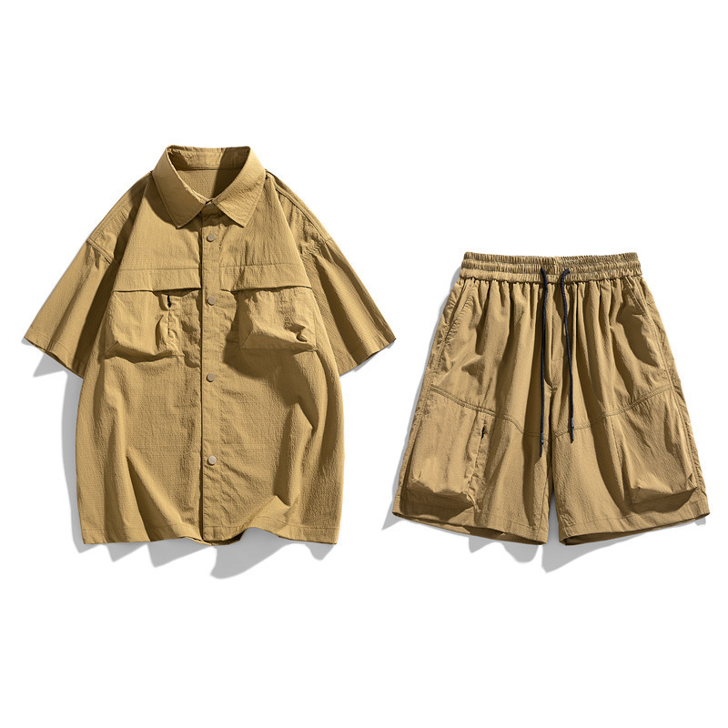 Trajes deportivos de moda masculinos de moda dos pantalones cortos de mangas cortas de verano sueltos y frescos al por mayor