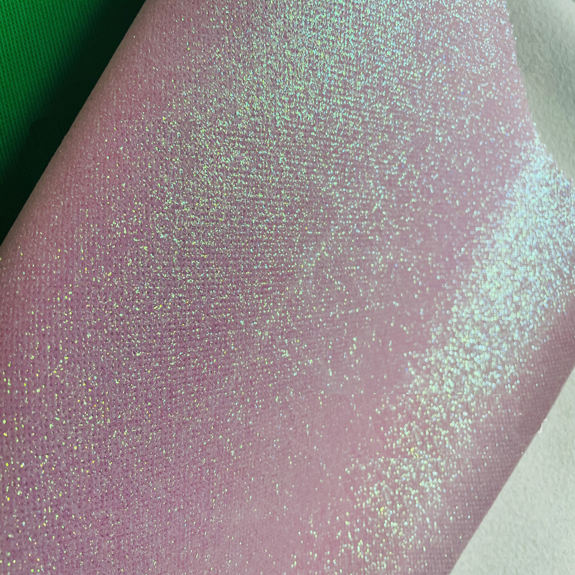 Suministro directo de fábrica de tela no tejida Glite Brillante Tela de lentejuelas Estuche para teléfono móvil Bolsa de cosméticos Accesorios para el cabello Decoración de ropa