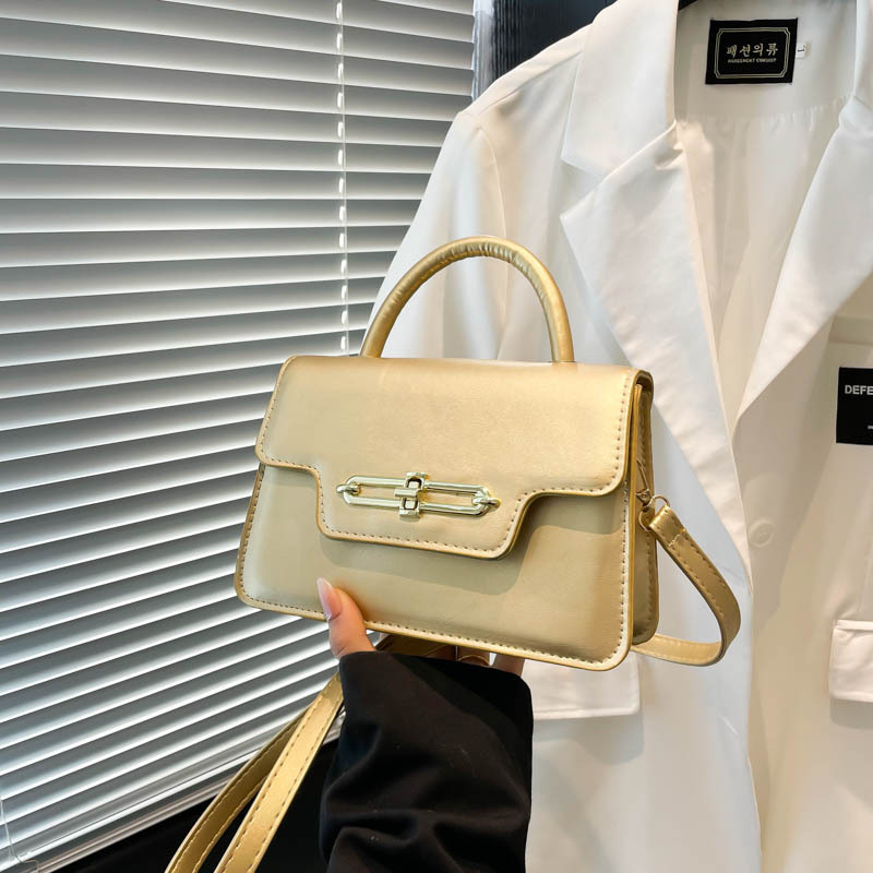 Bolso de hombro de gran capacidad retro 2025 primavera nuevo bloqueo de moda color caramelo empalme bolso de moda damas