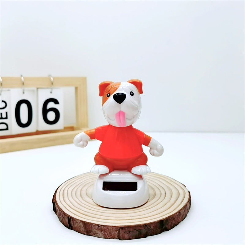 Adornos para automóviles cruzados, decoración para automóviles de resina, accesorios interiores para perros de palomitas de maíz para automóviles solares, sacudiendo la cabeza y llamando a la muñeca