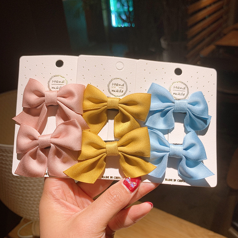 Korean Style Solid Color Children's Bow Hairpin display picture 5