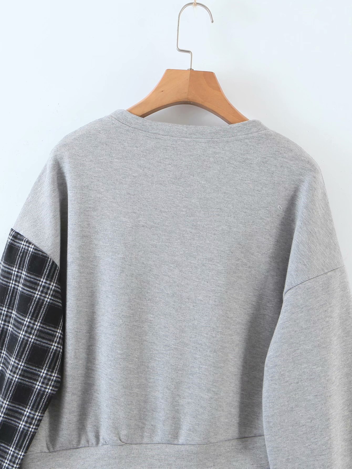 plaid stitching irregular hem sweatshirt NSAM26193