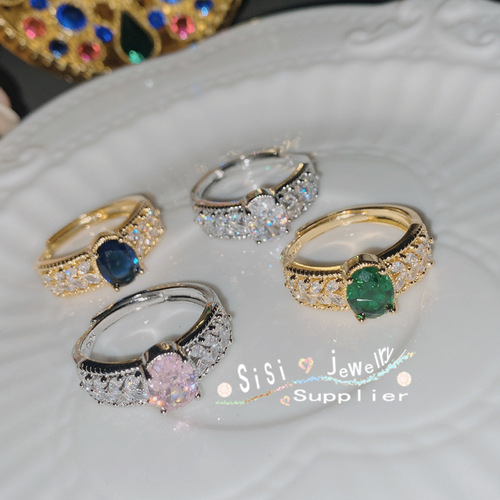 Sisi Italian palace hollow pattern colored sapphire blue corundum ring Haute lace emerald spindle ring