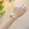 S34 white bead rabbit bracelet