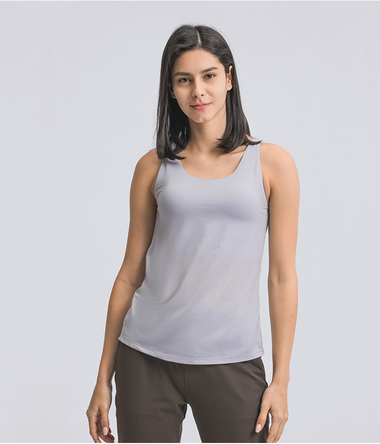 conjunto de yoga de dos piezas con blusa y sujetador de yoga con tirantes cruzados elásticos de color sólido NSDQF127370