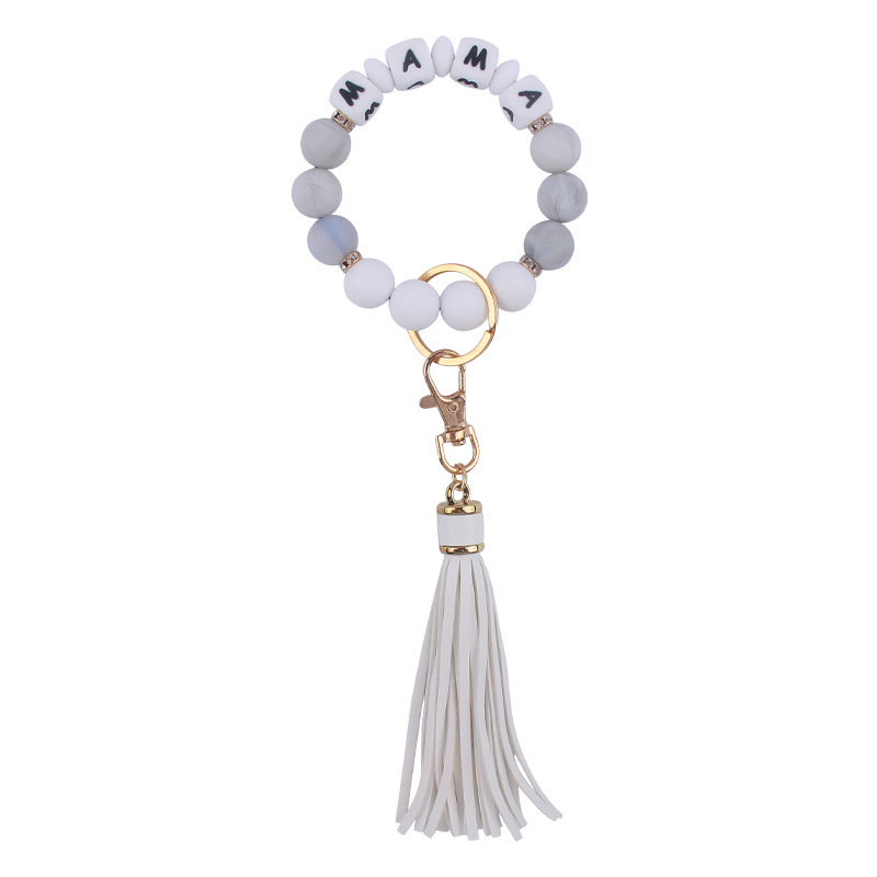 Nuevo cuero pu borla colgante creativo DIY nombre silicona con cuentas leopardo contraste color colgante pulsera llavero