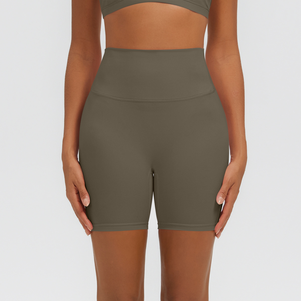 Nuevo tipo delgado de hielo, piel transpirable, ajustado, color sólido, ropa de yoga, pantalones cortos de tres puntos.