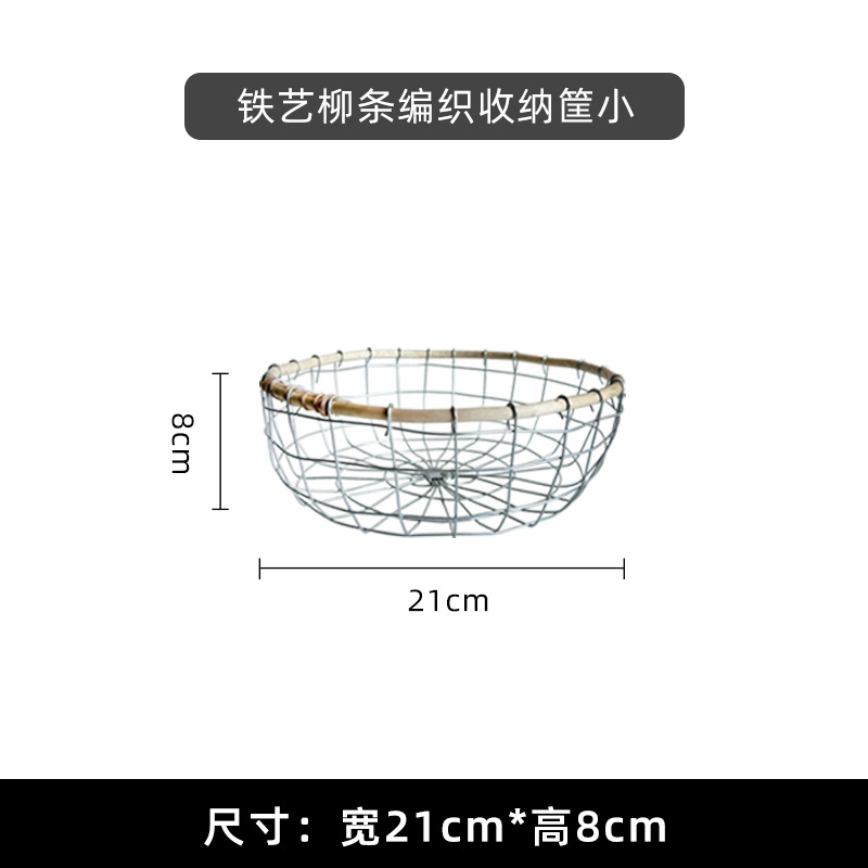 手作りの鉄芸の果物かごの卵かごの家庭用パンのお菓子のデザートかごの透かし彫りの収納かごのテーブルの上の物かご