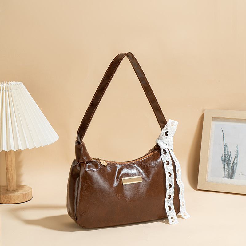 Bolso de cuero PU suave de cuero de aceite 2025 nueva moda universal bolso de moda de mujer bolso de brazo portátil pequeño
