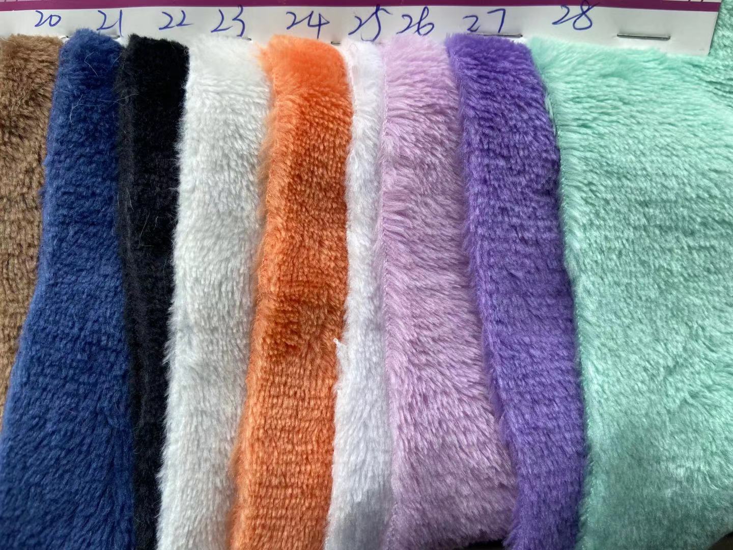 Tejido de poliéster de punto de doble cara de franela de lana de coral pijamas en casa manta ropa de tela textil para el hogar franela en stock