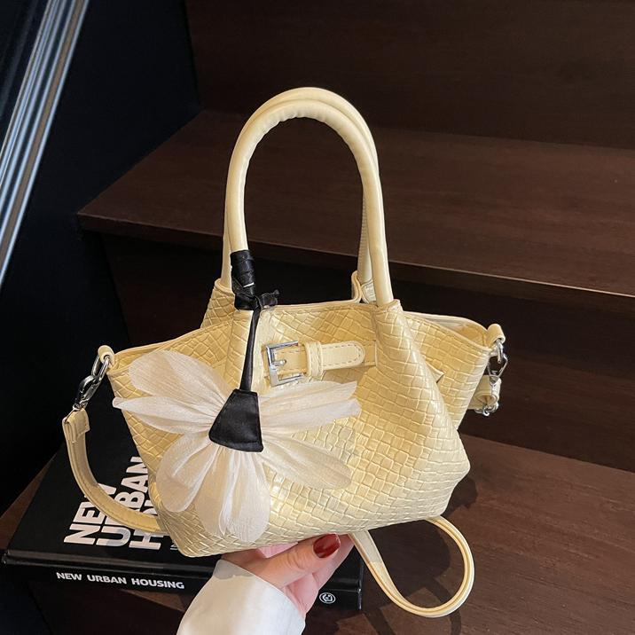 Bolso de cubo de mano de tendencia de nicho para mujer 2025 nuevo bolso de hombro de moda de viaje de trabajo bolso de mensajero de estilo occidental de todo fósforo
