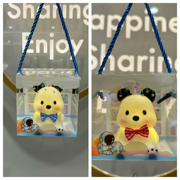 Small blue handheld gift box with bow, with little bears