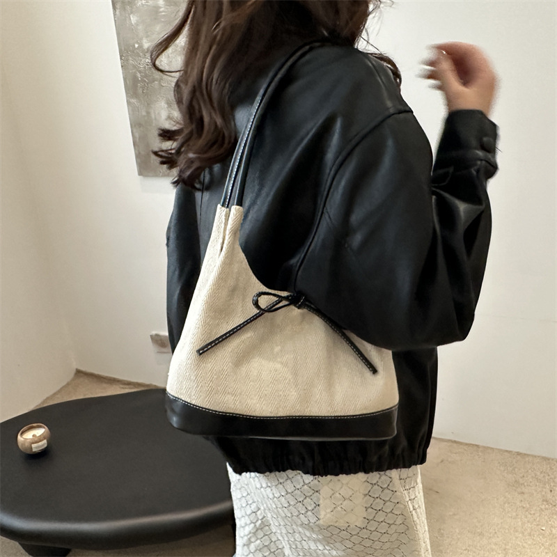 2024 nuevo nicho coreano retro empalme tela bolsa de mano bolso de hombro de gran capacidad bolso de brazo