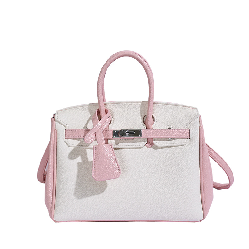 Bolso de platino portátil de litchi para mujeres 2026 comercio exterior nuevo estilo de alto nivel de sensación de tamaño de estilo de hombro mochila