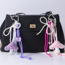 新款跨境皮革蘑菇包包挂件miu系珍珠链学生书包挂饰编织绳钥匙链