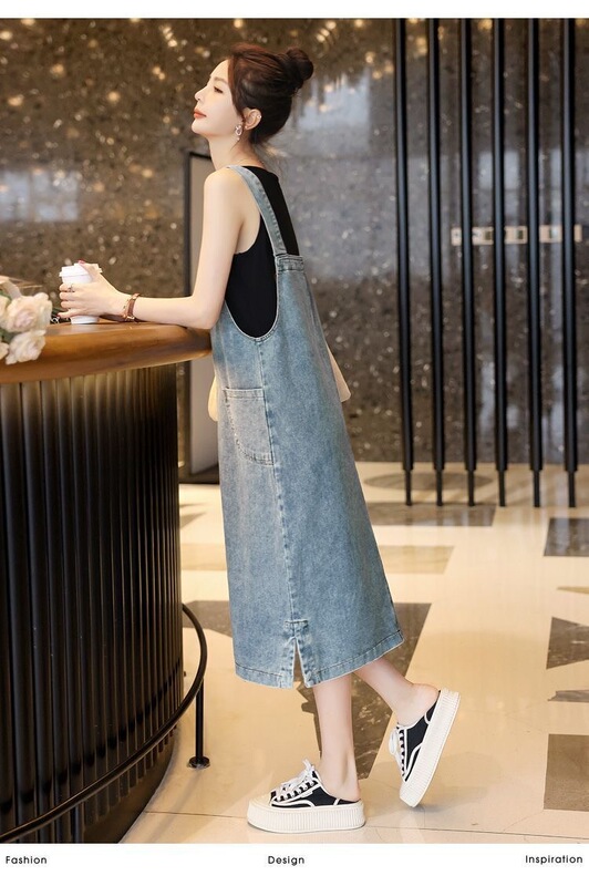 レトロなデニムの背もたれのスカートの夏の新型の女性のゆるいまっすぐな筒はやせている小さい大衆の中で長いタイプのa字のガーターのワンピースを現します。|undefined