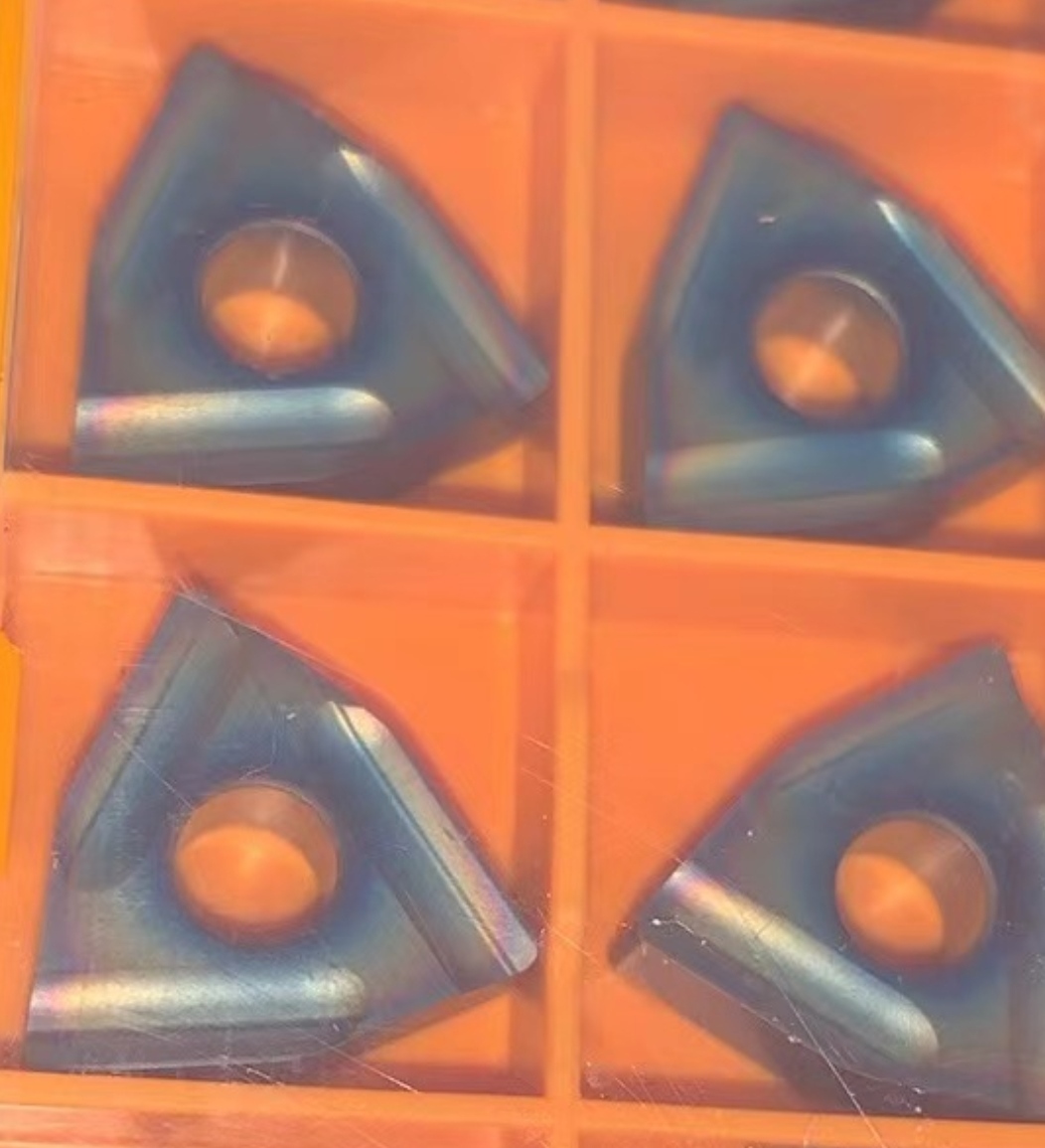 Hoja de temple CNC WNMG080408 Hoja de torneado cilíndrica en forma de melocotón superdura, acero para cojinetes, cabezal triangular TNMG