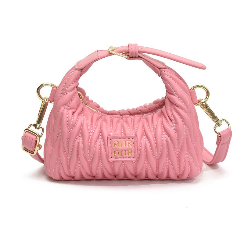 Bolsa de hombro de chicas plegadas de moda simple color sólido mini bolso de bebé 2025 nuevo bolso infantil transfronterizo