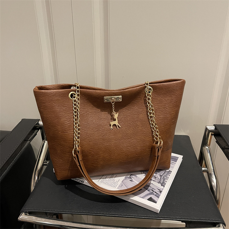Bolsas de gran capacidad de mujeres de este año, cadenas de moda populares de hombro de alto nivel, bolsas de transporte polivalentes extranjeras