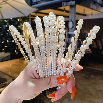 Estilo coreano perla diadema al por mayor nueva presión simple horquilla Internet celebridad versátil dulce alto sentido tocado diadema