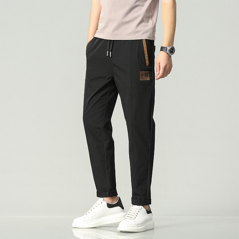 Pantalones casuales de los hombres primavera y otoño nuevo slim fit flaco chino bordado elástico cintura encaje casual jeans ropa