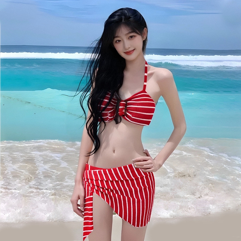 2025 nuevo traje de baño de tres piezas de bikini sexy femenino traje de baño de vacaciones de playa dividido a rayas de alta gama al por mayor