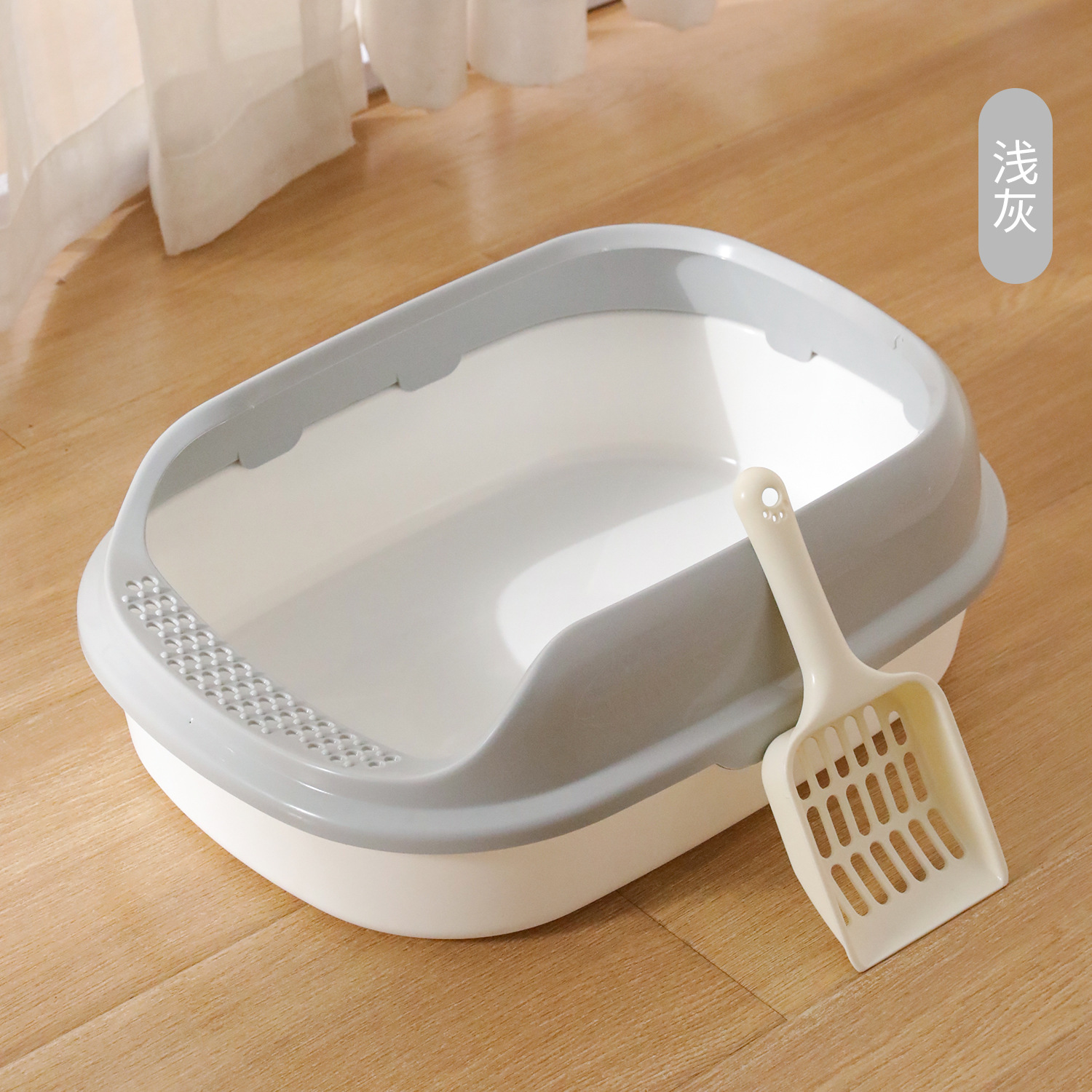 Caja de arena para gatos en stock al por mayor de alto borde a prueba de grietas de tamaño pequeño caja de arena para gatos naranja resistente a las caídas PP resina de cuero Taobao gato inodoro