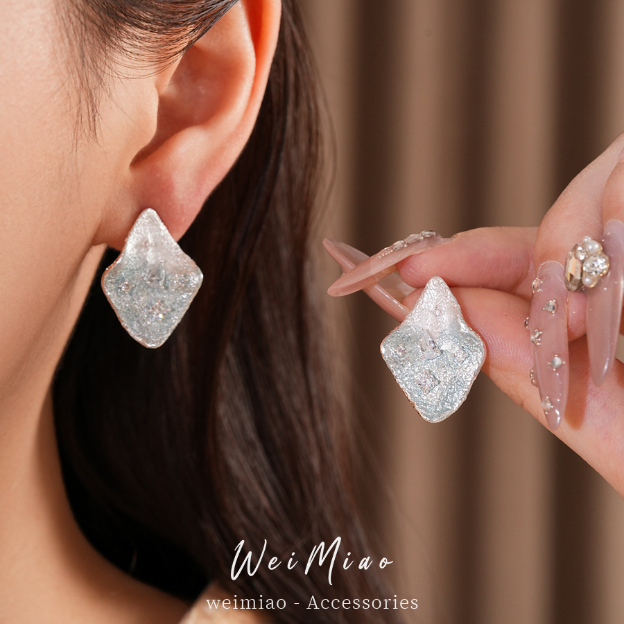 Agujas de plata, pendientes de piedra de silicio de silicio, estilo simple, personalidad, pendientes de lujo ligero, pendientes de alta sensación al por mayor